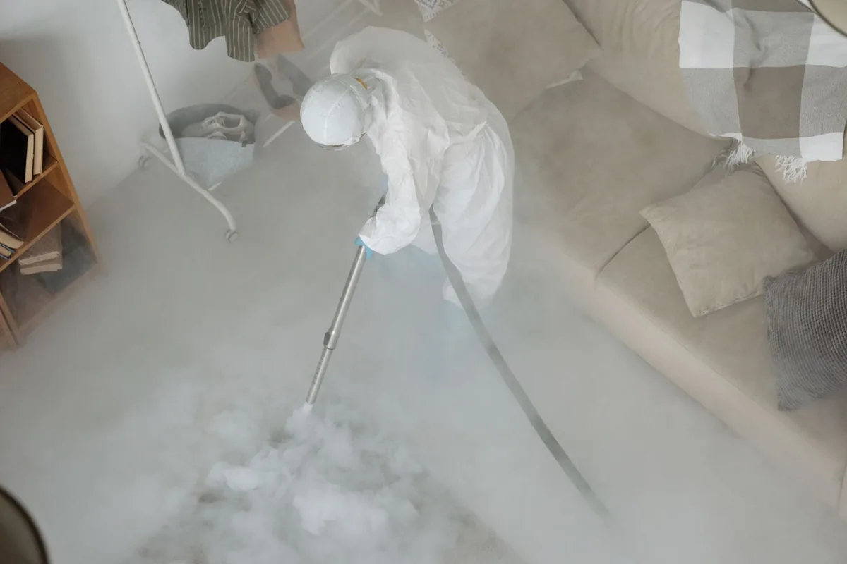Biohazard cleanup technician in protective equipment, Palmetto, FL